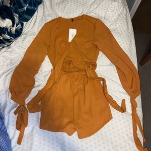 Burnt orange tie front romper!